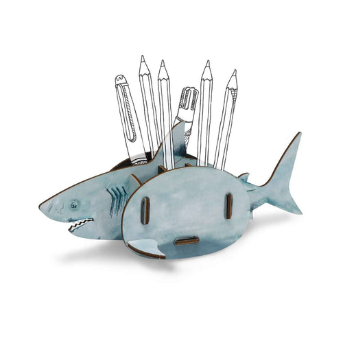 Shark-shaped stationery set with pens and pencils on a white background