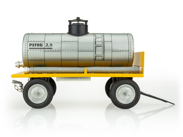 A kovap toy cistern trailer made of metal with a yellow base and gray tank