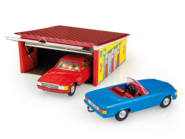 Kovap Toy garage with red car inside and blue car outside on a white background