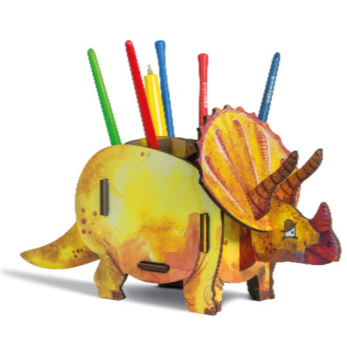 wooden pen pot in the shape of a yellow triceratops dinosaur