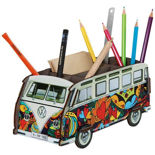 Colorful Volkswagen van-shaped pencil holder with stationery items on a white background
