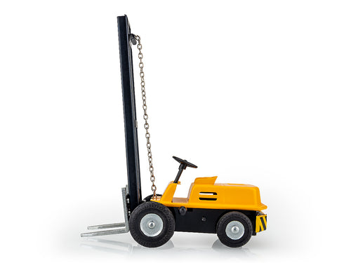 A toy forklift truck with a yellow body, black seat, and gray forks, set against a white background.