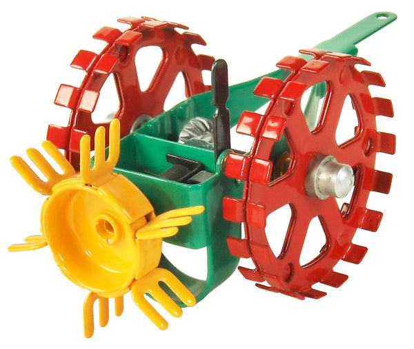 A toy model of a potato spinner, predominantly red with green and yellow accents, designed for attaching to tractors.