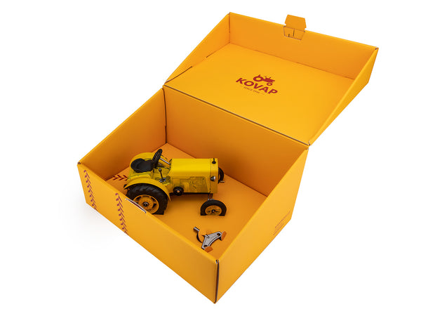Kovap Tractor 75 Yellow side view in open Kovap yellow box