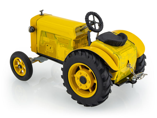 Kovap Tractor 75 Yellow tin toy left side view