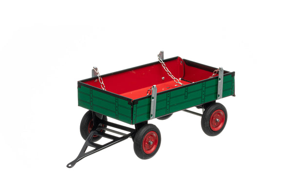 A green and red toy trailer with a folding tailgate, suitable for children and collectors, made with handmade craftsmanship.